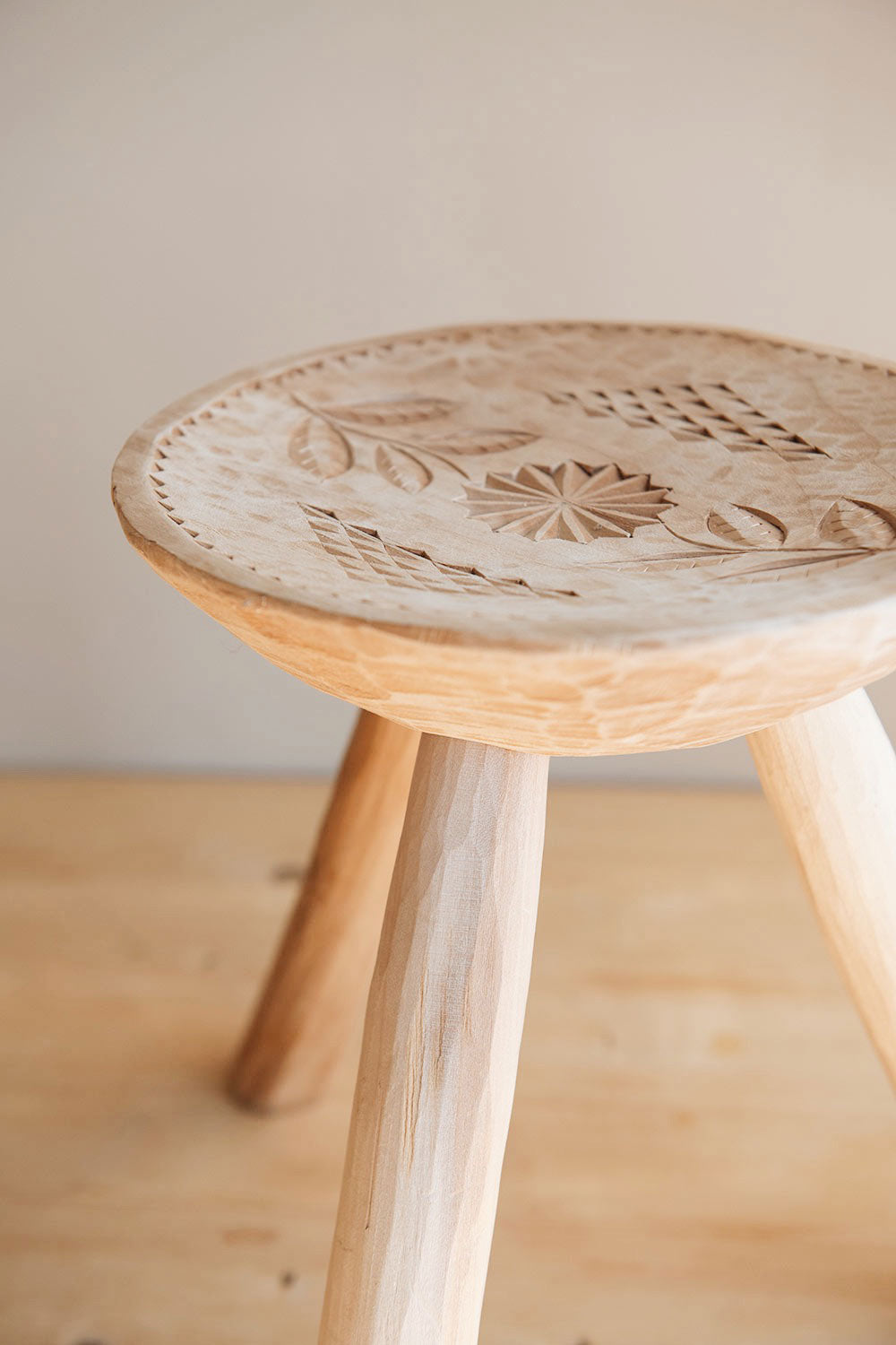 Hand-carved Wooden Stool with Motif
