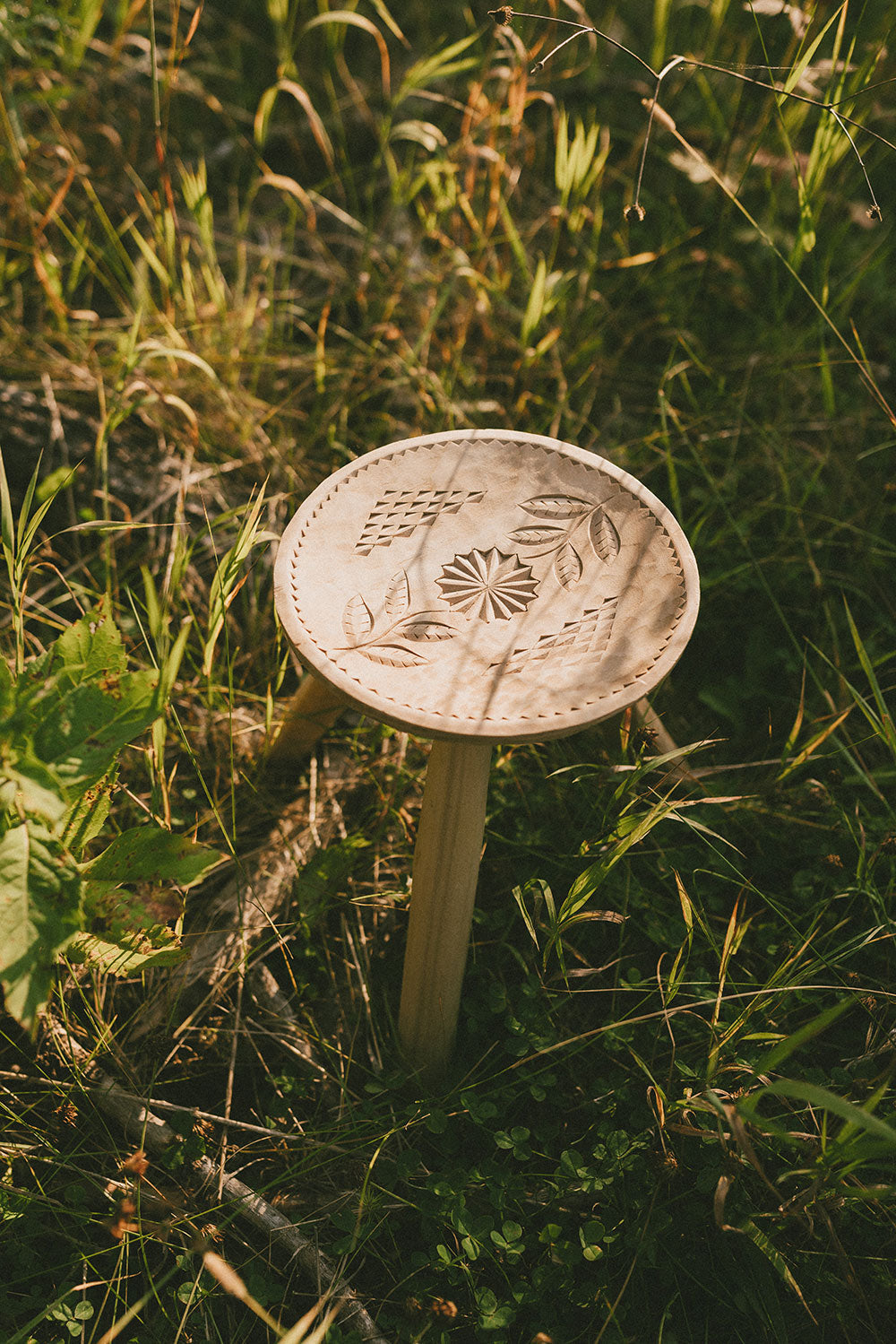 Hand-carved Wooden Stool with Motif